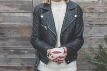 Load image into Gallery viewer, woman wearing classic biker-style leather jacket

